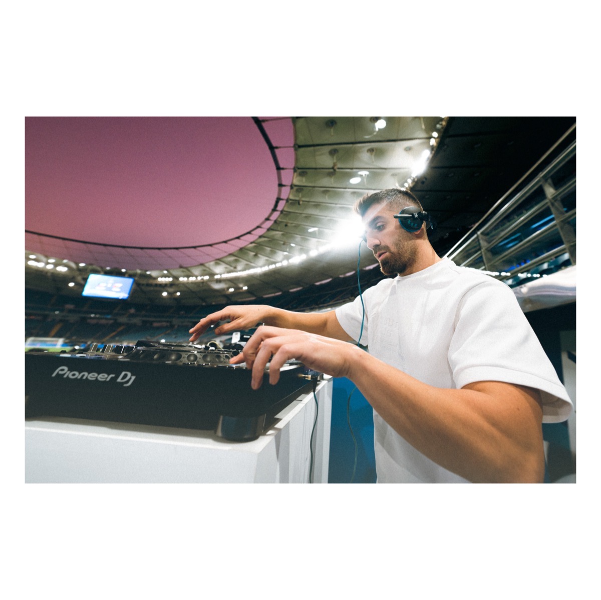 DJ Jackz on the decks at a stadium show